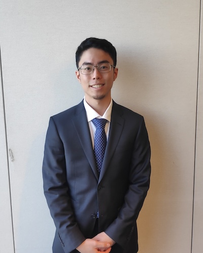 Shintaro Umeki, in a business suit and tie