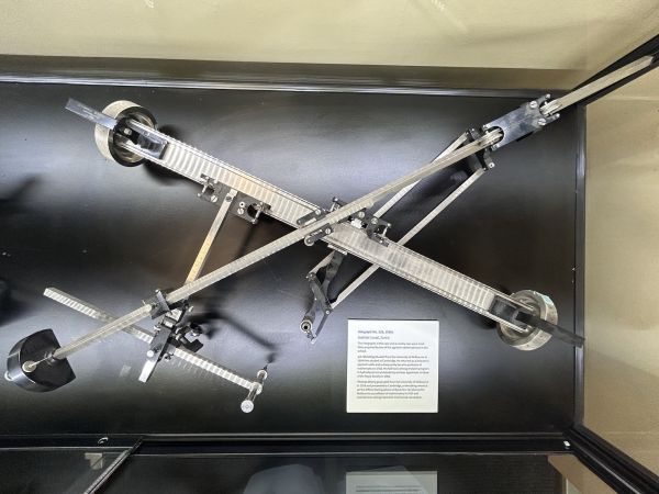 An integraph behind a glass case