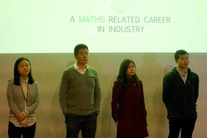 Recent graduates come to talk to students at the Real World Maths in Action fair to talk about how they have used their maths studies in their careers.